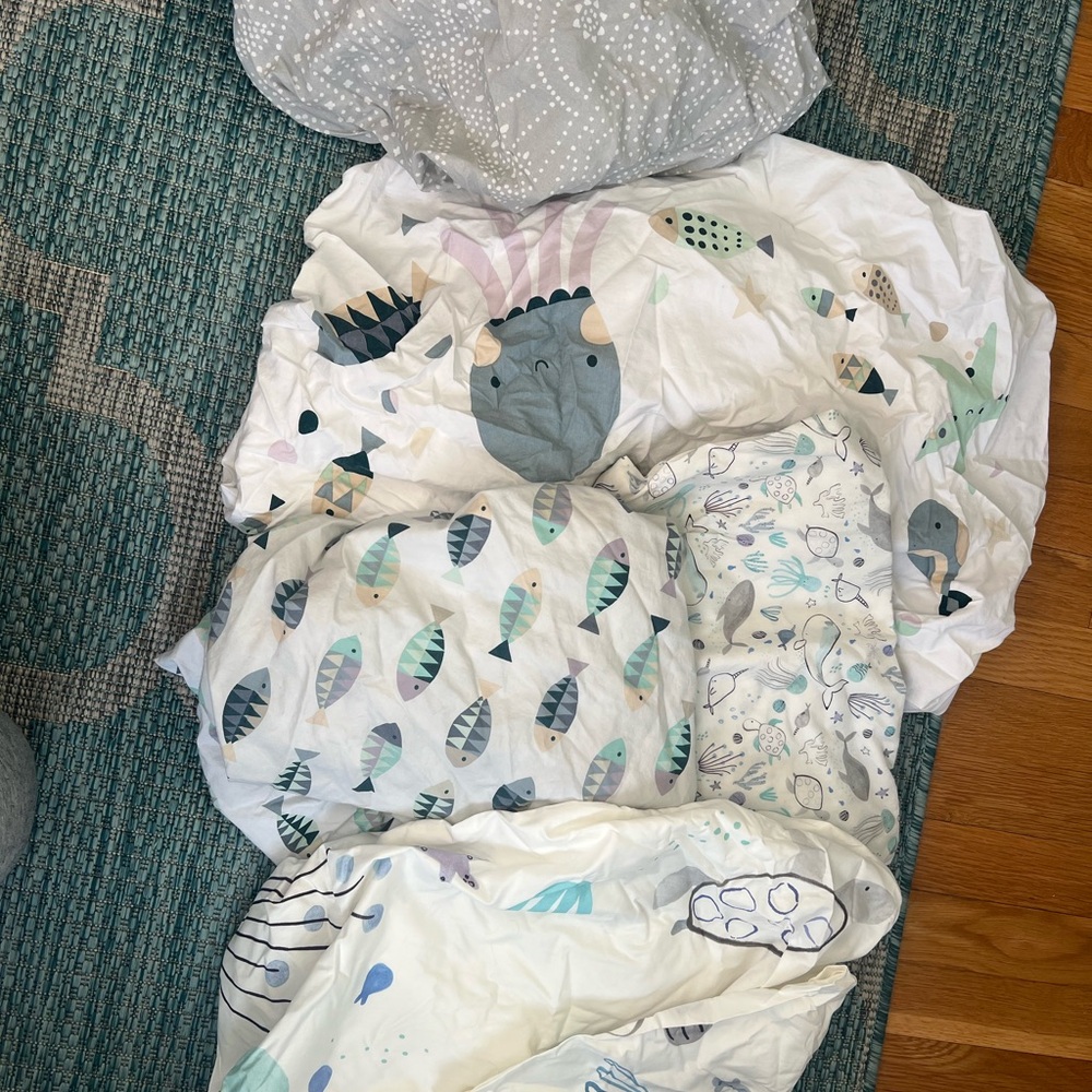 Like new crib sheets. Crate & barrel and pottery Barn